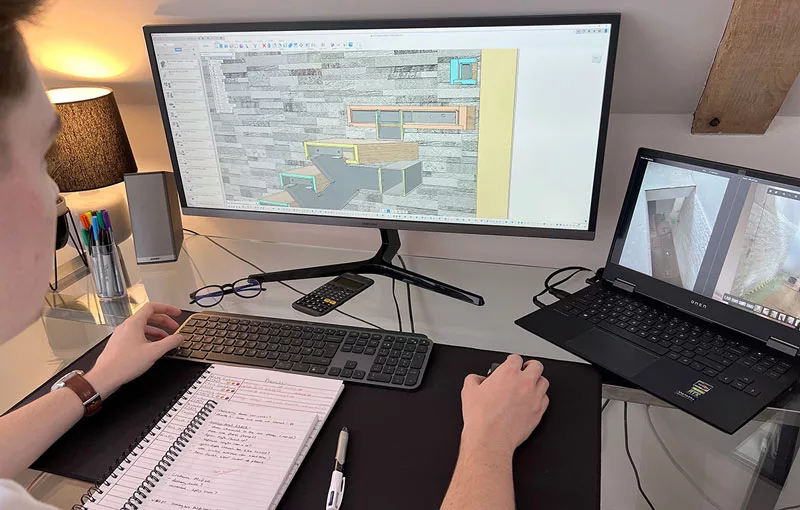 Designer modelling a bespoke staircase in 3D CAD software